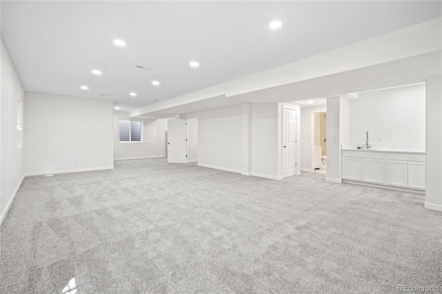 1511 Peninsula Cir, Castle Rock, CO 80104 - finished basement with recessed lighting, light colored carpet, and bar
