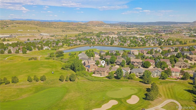 1511 Peninsula Cir, Castle Rock, CO 80104 - aerial view of residential area featuring a water and mountain view and a golf course
