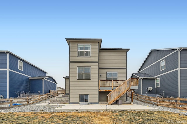 rear view of house with a patio