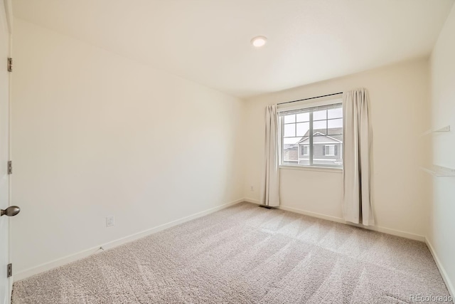 view of carpeted spare room