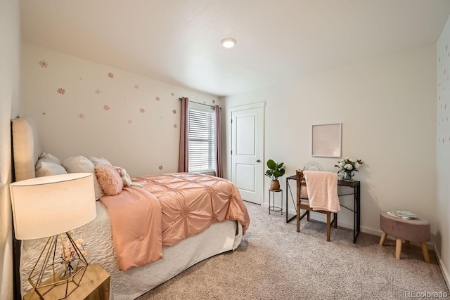 carpeted bedroom with a closet