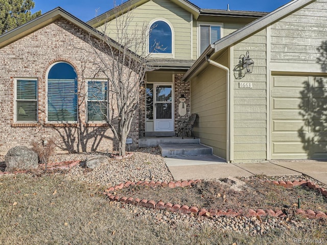 property entrance featuring a garage