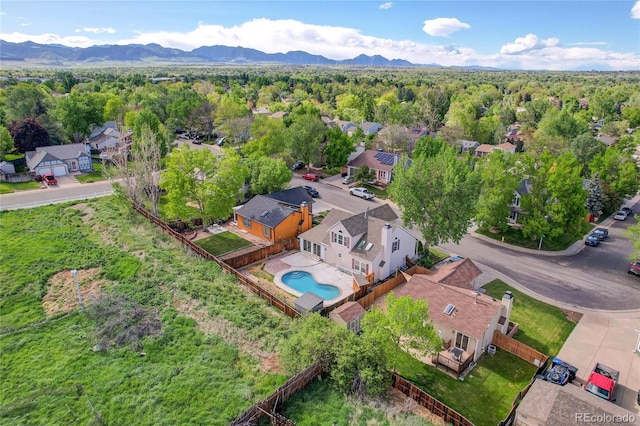 13270 W 65th Ave, Arvada, CO 80004 - aerial view of residential area with a pool and mountains