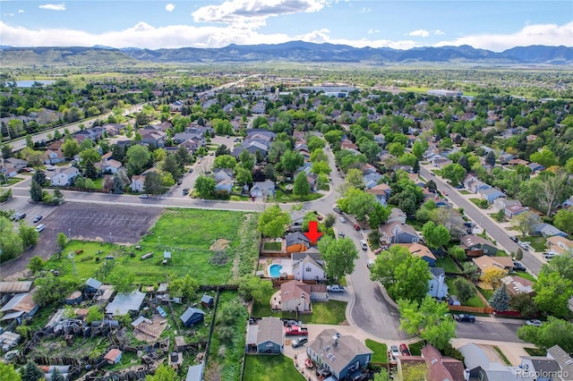 13270 W 65th Ave, Arvada, CO 80004 - aerial view of residential area featuring a mountainous background