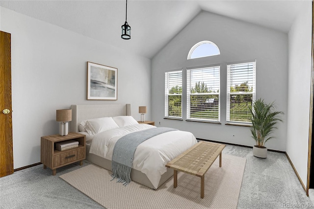 13270 W 65th Ave, Arvada, CO 80004 - carpeted bedroom featuring lofted ceiling and baseboards
