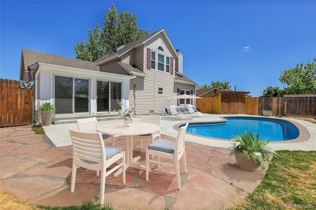 13270 W 65th Ave, Arvada, CO 80004 - view of swimming pool featuring a patio area and fence