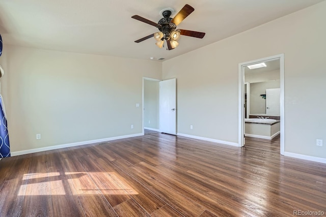 unfurnished bedroom featuring dark wood-type flooring and ceiling fan