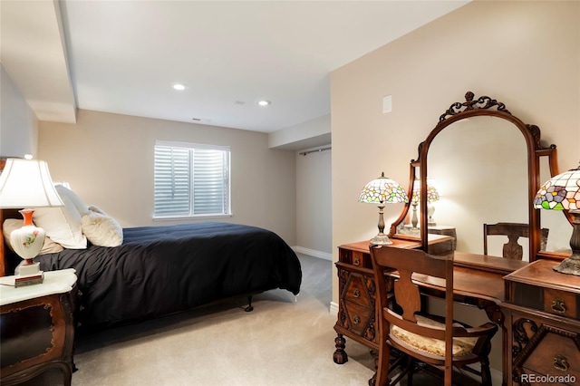 bedroom with baseboards, recessed lighting, visible vents, and light carpet