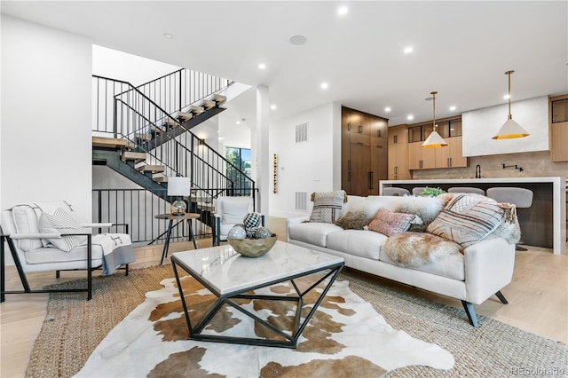 living room with light hardwood / wood-style floors