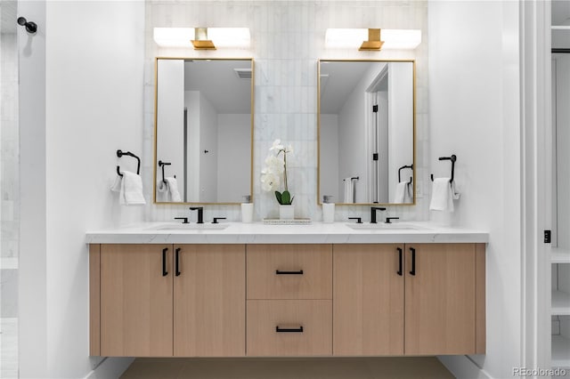 bathroom with backsplash and vanity