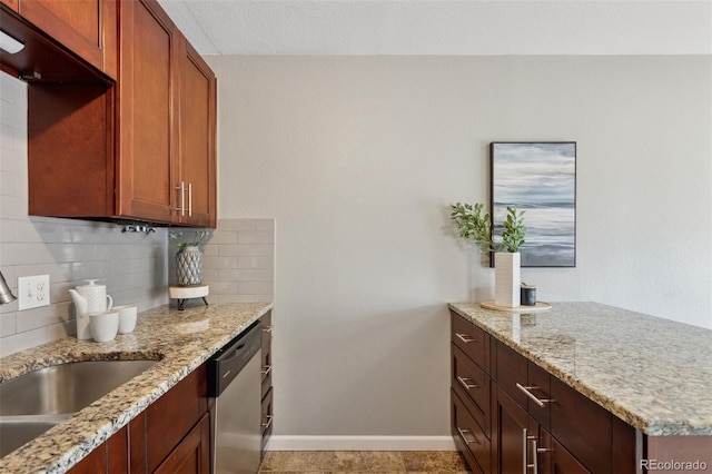 2854 N Lowell Blvd, Denver, CO 80211 - kitchen featuring dishwasher, tasteful backsplash, light stone countertops, and a peninsula