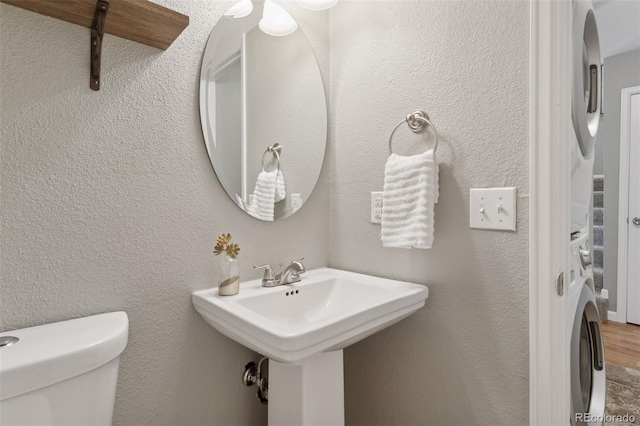 2854 N Lowell Blvd, Denver, CO 80211 - half bathroom with toilet and wood finished floors