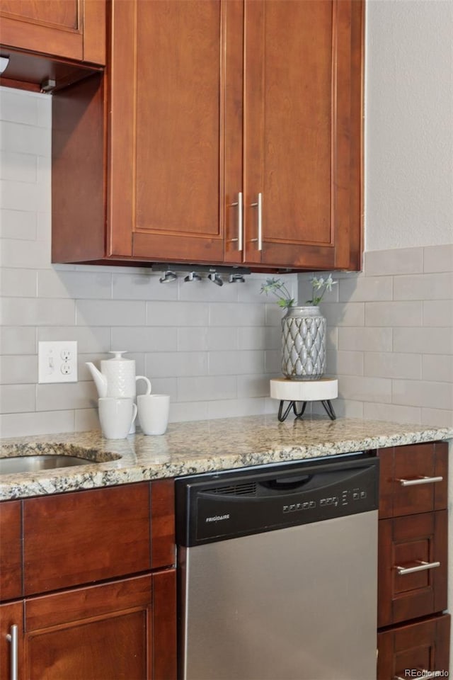 2854 N Lowell Blvd, Denver, CO 80211 - kitchen featuring dishwasher, backsplash, and light stone countertops