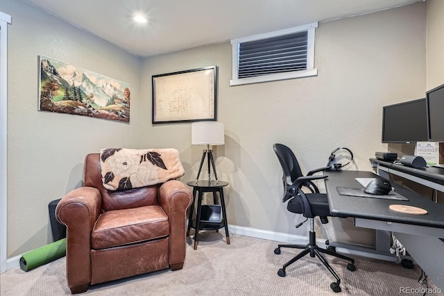 office featuring baseboards and light colored carpet