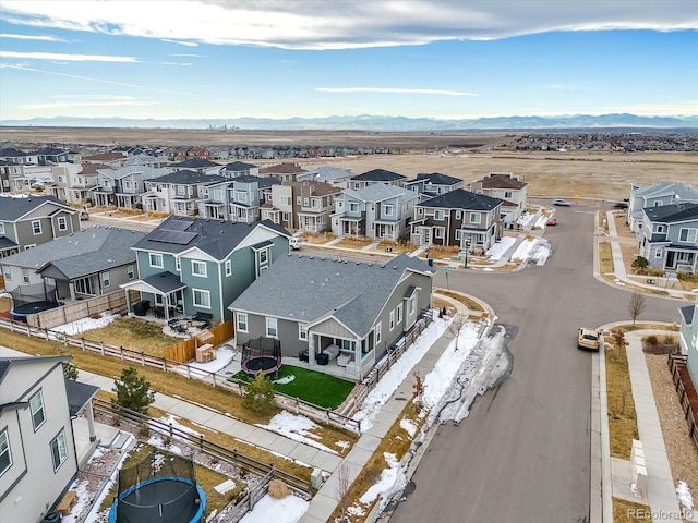 drone / aerial view featuring a mountain view and a residential view