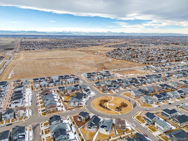 birds eye view of property with a residential view and a mountain view