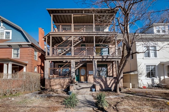 1120 N Clarkson St Unit 6, Denver, CO 80218 - view of front of home with stairway and a balcony