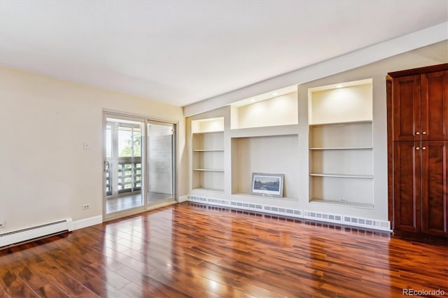 unfurnished living room with vaulted ceiling, baseboard heating, dark hardwood / wood-style floors, and built in features