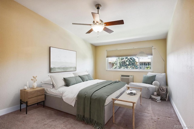 bedroom featuring carpet flooring, an AC wall unit, and ceiling fan