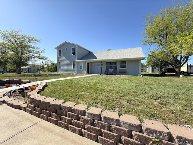 14 W 3rd St, Flagler, CO 80815 - view of front facade featuring a front yard