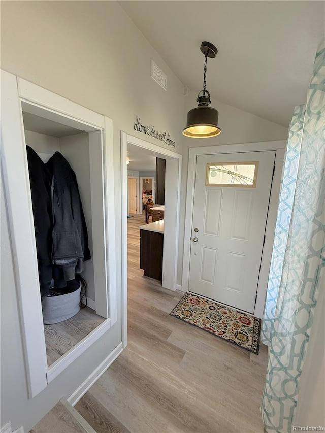 14 W 3rd St, Flagler, CO 80815 - foyer with vaulted ceiling and light wood-style flooring