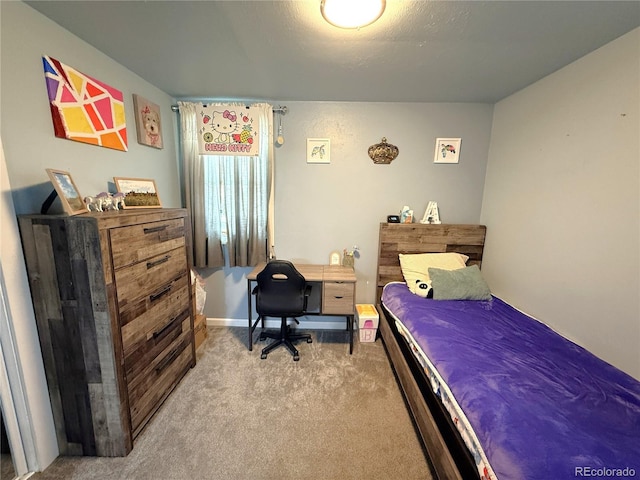 14 W 3rd St, Flagler, CO 80815 - bedroom with carpet floors