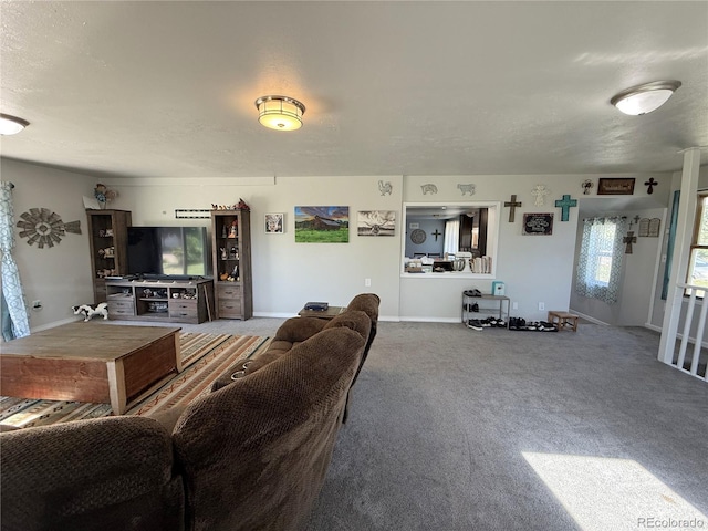 14 W 3rd St, Flagler, CO 80815 - carpeted living area with baseboards