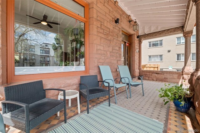 view of patio / terrace featuring ceiling fan