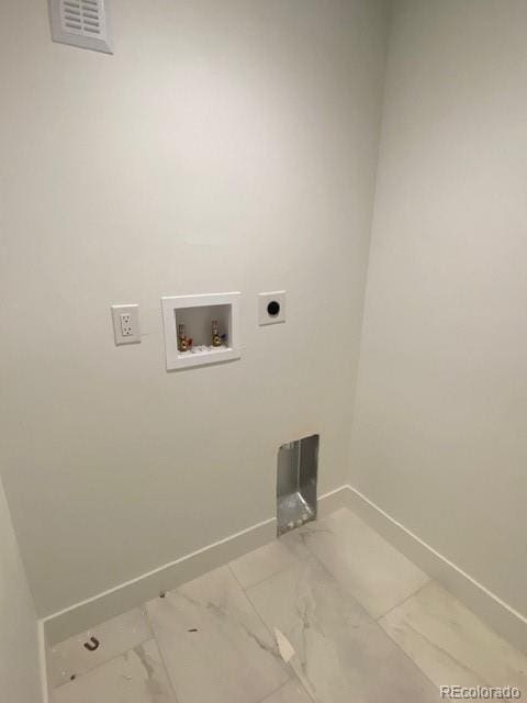 washroom featuring laundry area, washer hookup, baseboards, marble finish floor, and electric dryer hookup