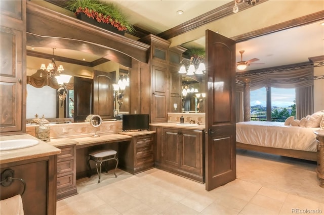 17540 Pond View Pl, Colorado Springs, CO 80908 - full bathroom with ornamental molding, a chandelier, vanity, ceiling fan, and connected bathroom