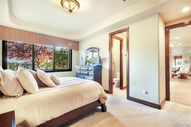 17540 Pond View Pl, Colorado Springs, CO 80908 - bedroom with light colored carpet, ensuite bath, recessed lighting, and baseboards