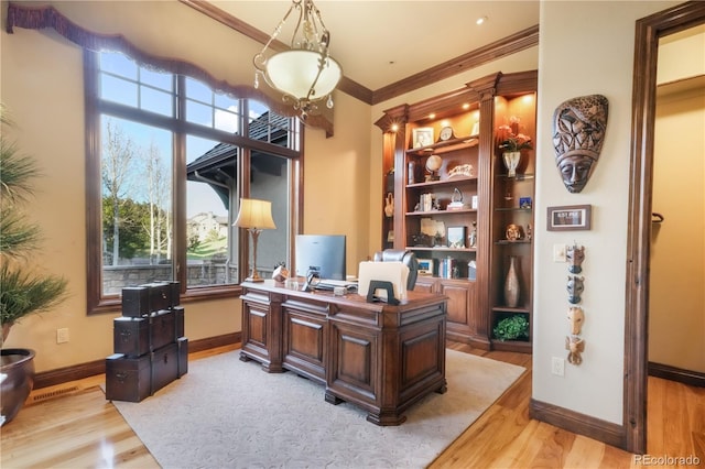 17540 Pond View Pl, Colorado Springs, CO 80908 - office space featuring light wood-style floors, crown molding, and baseboards