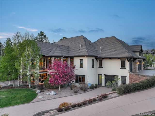 17540 Pond View Pl, Colorado Springs, CO 80908 - view of front of property featuring stucco siding and stone siding