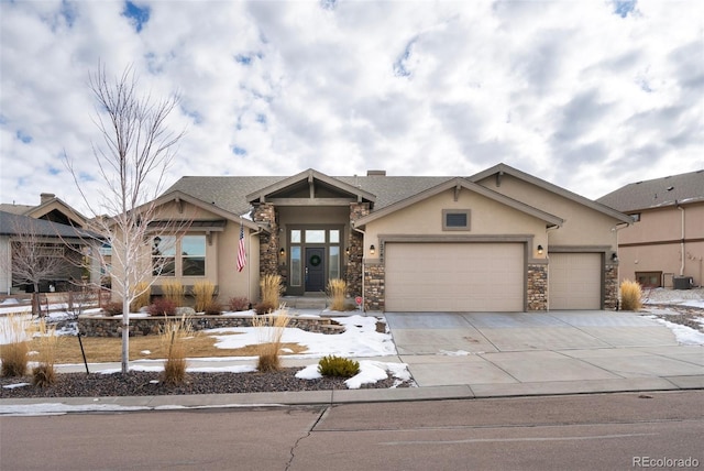 craftsman-style home with a garage