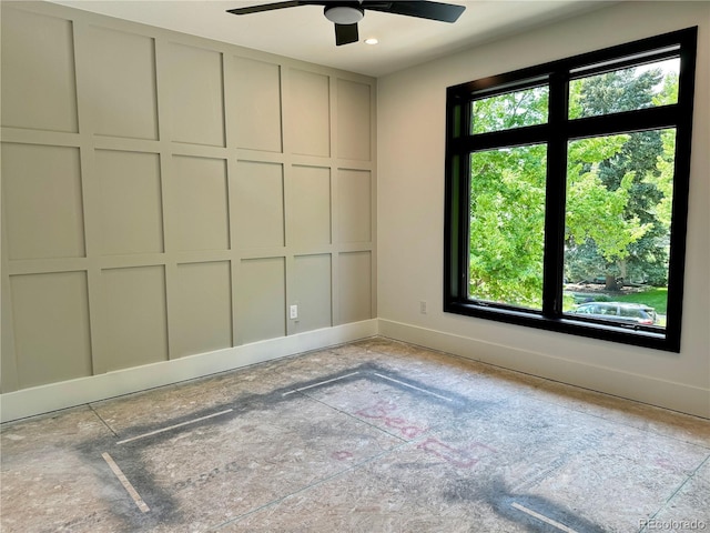 2442 S Saint Paul St, Denver, CO 80210 - empty room with baseboards and a ceiling fan