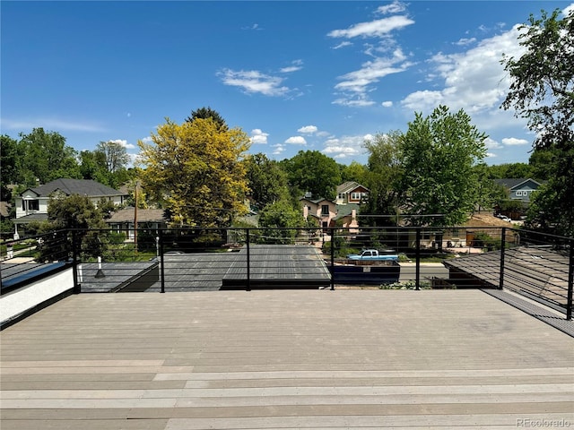 2442 S Saint Paul St, Denver, CO 80210 - wooden deck featuring a residential view and view of wooded area