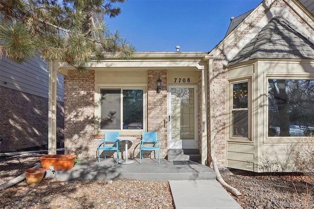 entrance to property featuring a patio