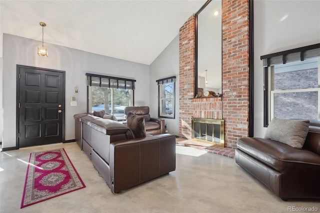 living room with a brick fireplace and high vaulted ceiling