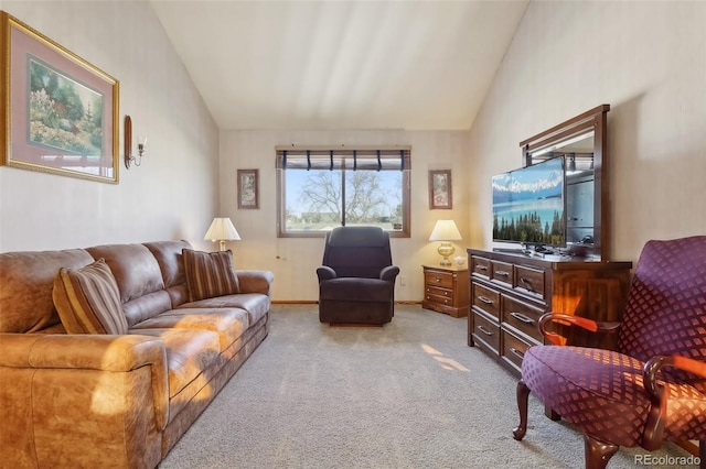 carpeted living room with lofted ceiling