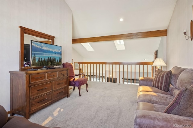 living room featuring vaulted ceiling with skylight and light carpet