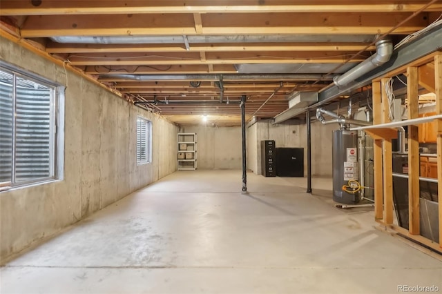 basement featuring water heater