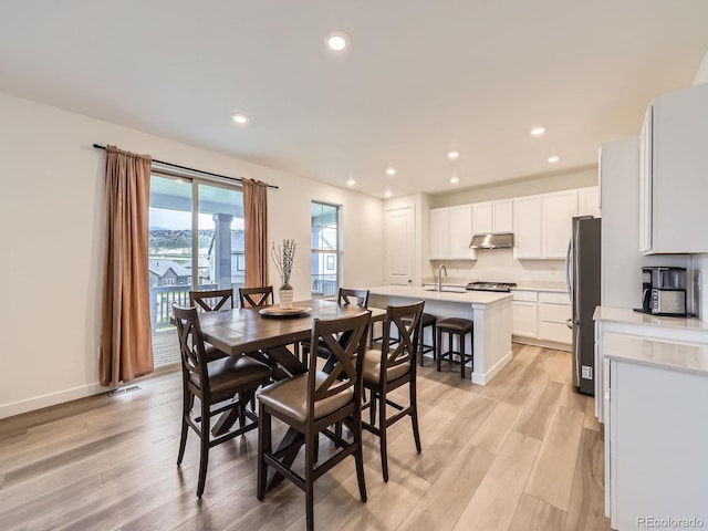 2967 S Quaker St, Morrison, CO 80465 - dining space featuring light wood finished floors and recessed lighting