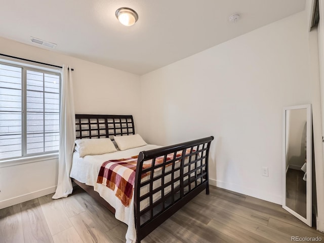 2967 S Quaker St, Morrison, CO 80465 - bedroom featuring wood finished floors and baseboards
