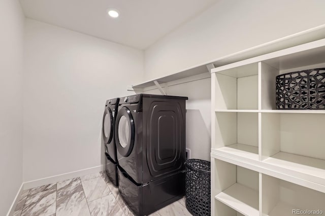 2967 S Quaker St, Morrison, CO 80465 - washroom with washer and dryer, marble finish flooring, and recessed lighting