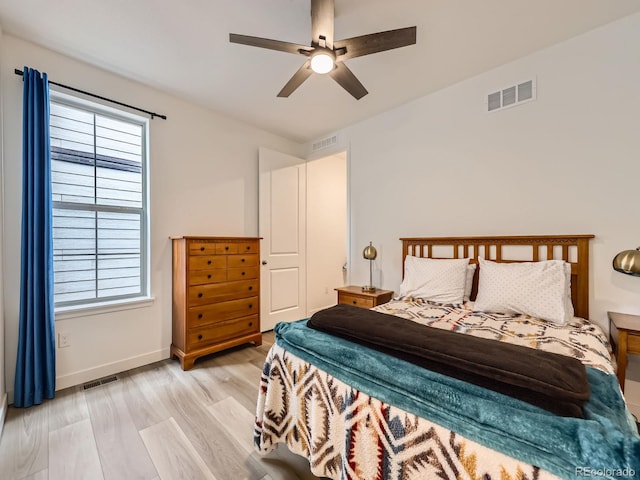 2967 S Quaker St, Morrison, CO 80465 - bedroom with light wood-style floors and a ceiling fan