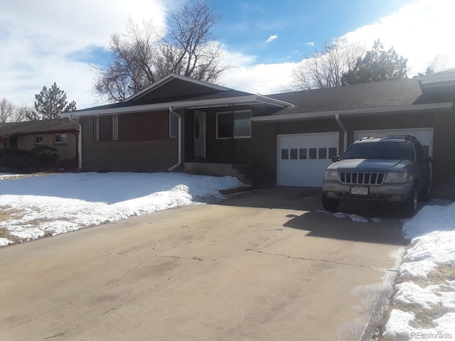 single story home featuring a garage