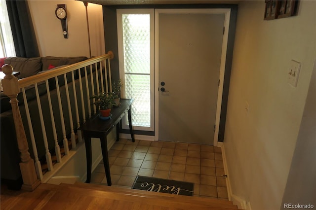 1936 S Poplar St, Denver, CO 80224 - tiled entryway with baseboards