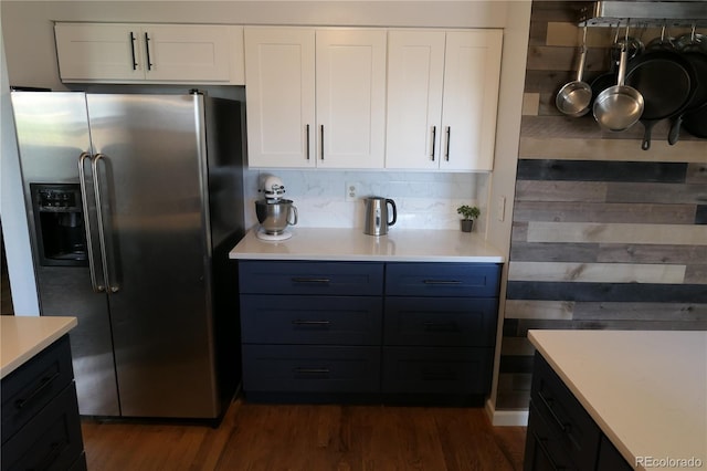 1936 S Poplar St, Denver, CO 80224 - kitchen with stainless steel refrigerator with ice dispenser, dark wood-type flooring, white cabinetry, and light countertops