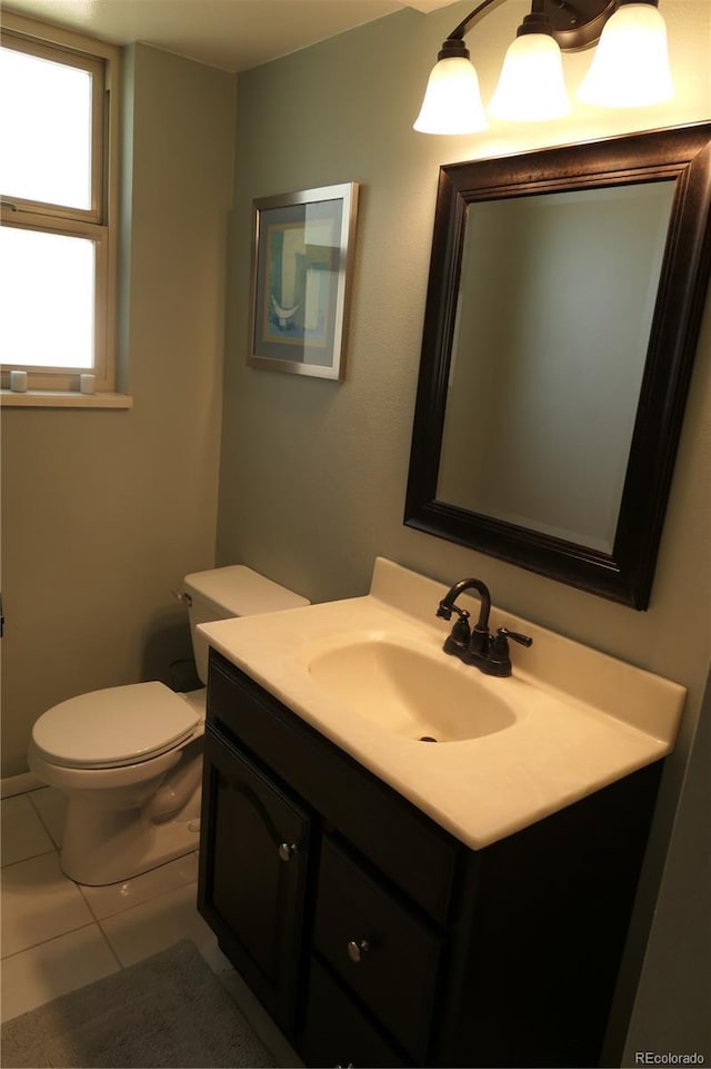 1936 S Poplar St, Denver, CO 80224 - bathroom featuring vanity and tile patterned floors
