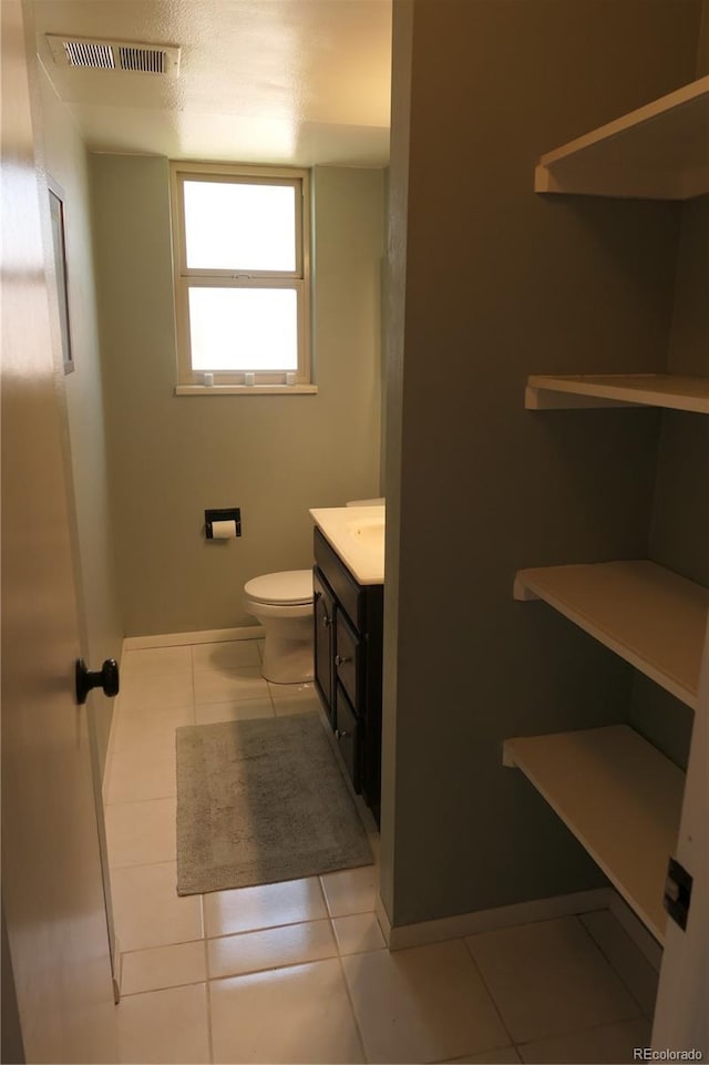 1936 S Poplar St, Denver, CO 80224 - bathroom featuring vanity and tile patterned flooring